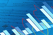 A bar graph superimposed on top of a tax return.